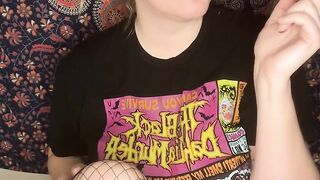 smoking a cigarette with black lipstick