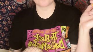 smoking a cigarette with black lipstick