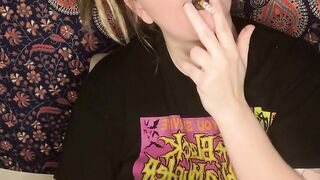 smoking a cigarette with black lipstick