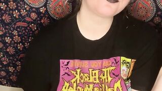 smoking a cigarette with black lipstick